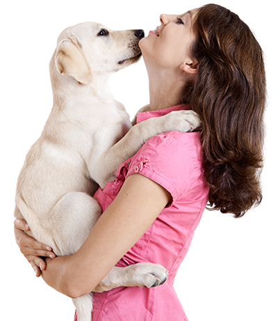 Woman hugging puppy